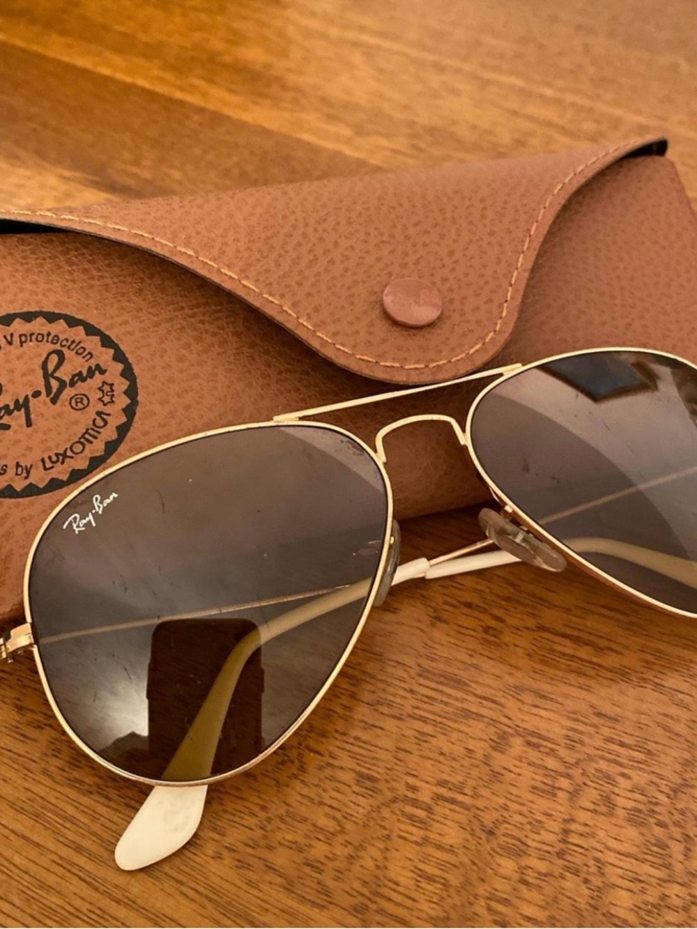 Ray-Ban women’s Gold Aviator Sunglasses with Brown Lenses